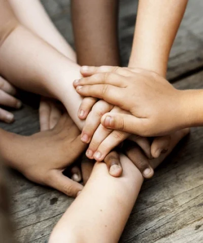 diverse-hands-join-together-on-600nw-612141731